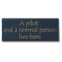 A PILOT AND A NORMAL PERSON LIVE HERE WOOD SIGN