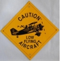 CAUTION LOW FLYING METAL SIGN